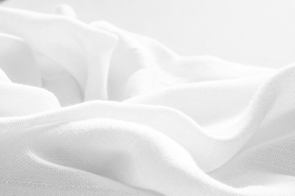 a-black-and-white-photo-of-a-white-cloth-px-jn5vc62u